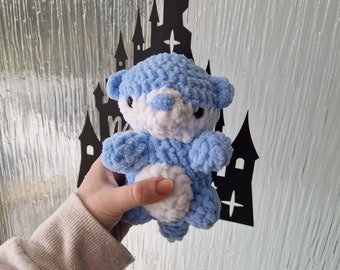 Crochet light blue otter made with chenille super soft yarn and safety eyes