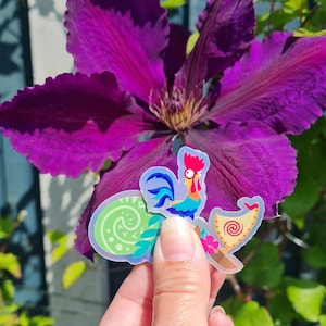 Pegatina de vinilo de Moana Voyager con efecto holográfico, Hei Hei, Tefiti Heart y Canoe.