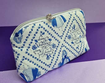 Sleeping Beauty spinning wheel triangle shaped cosmetic bag pouch with themed zipper pull