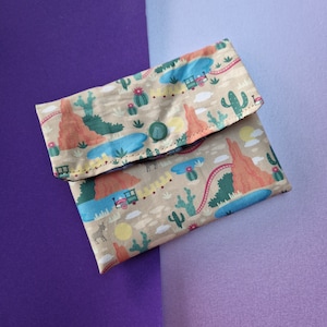 Big Thunder Mountain double pocket pouch with water resistent fabric and a popper