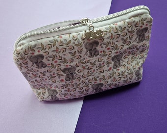 Floral Elephant triangle shaped cosmetic bag pouch with silver flying Dumbo elephant zipper pull