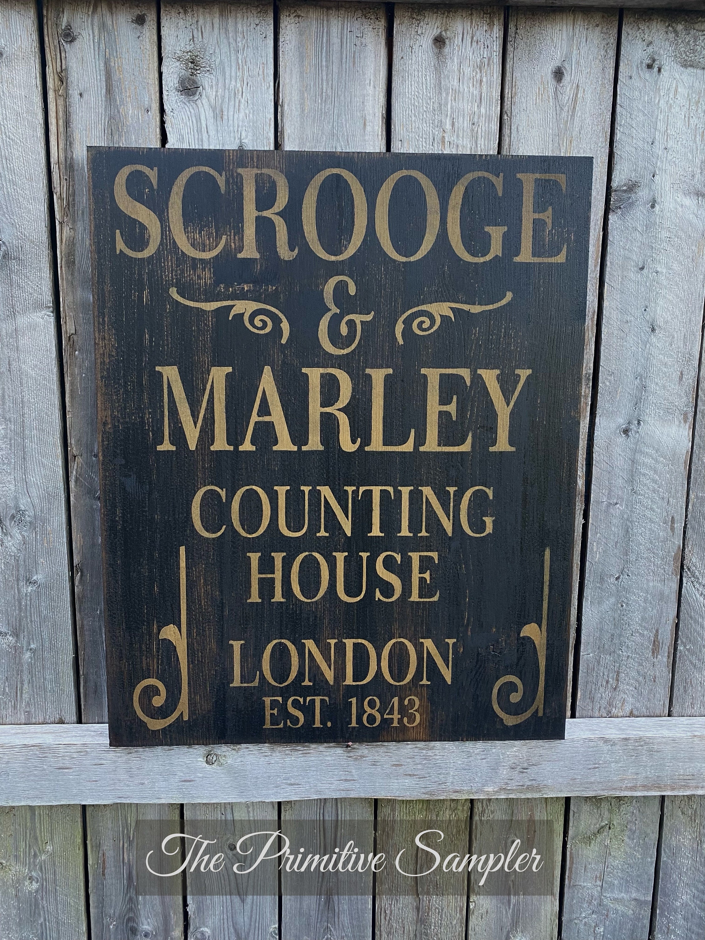Scrooge and Marley Sign