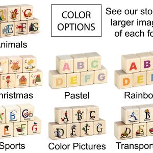 May include: A collection of light-colored wooden blocks arranged in groups, each featuring letters A through G. The sets display various themes including animals, Christmas, pastel colors, rainbow letters, sports, color pictures, and transportation.