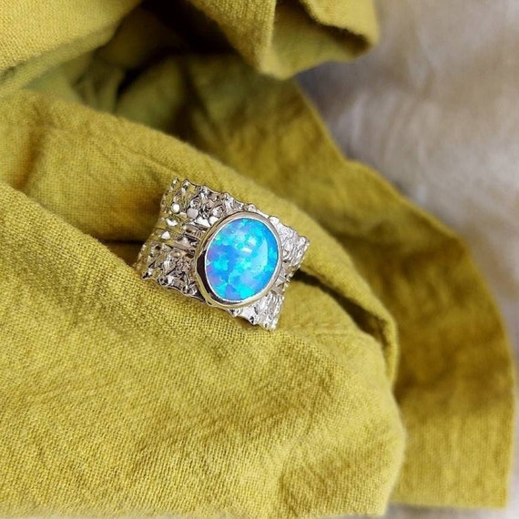 Sterling Silver Amethyst, Blue Topaz, Opal & Peridot Textured 4 Band Ring Set Sterling Silver Amethyst, Blue Topaz, Opal & Peridot Textured 4 Band Ring Set