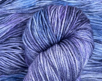 Hand dyed 100% merino superwash yarn in "Blueberry", DK weight, Variegated blue and purple colorway