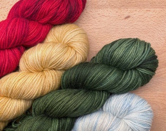 Hand dyed 100% fine merino superwash yarn, DK weight, Winter Collection, Green, Red, Gold, White