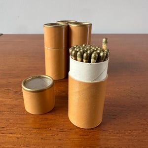 Vintage golden match boxes, set of four