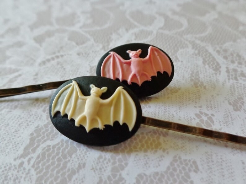Pink on Black And Ivory on Black Bat And Brass Hair Clips