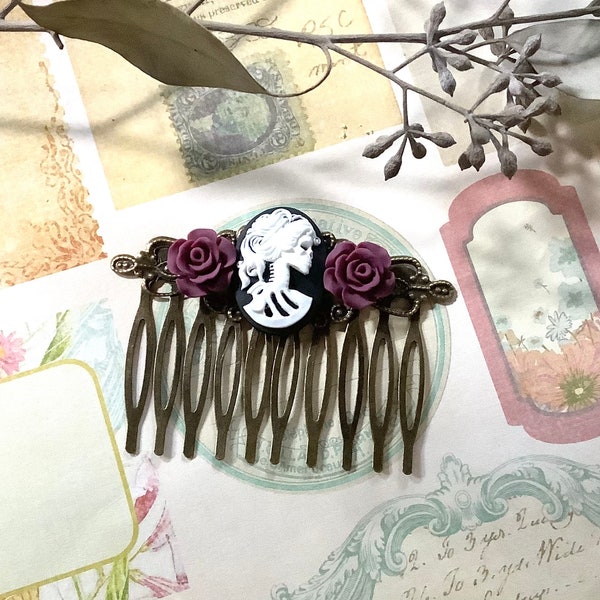 She Skull and Burgundy Roses Brass Hair Com