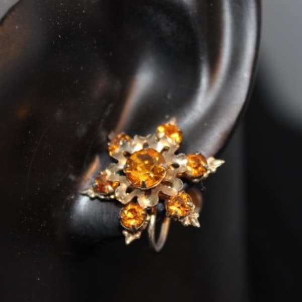 Beautiful Amber snowflake shaped rhinestone screwback earrings - Unsigned