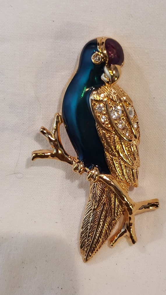 AVON - Beautiful multicolor Parrot with gold and r