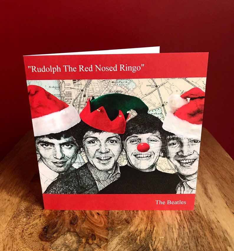 The Beatles Christmas card. Funny portrait in pen over map of image 0