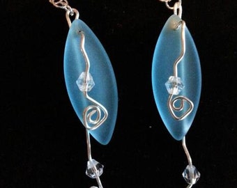 Swarovski Crystals Dangle From Light Turquoise Sea Glass Earrings