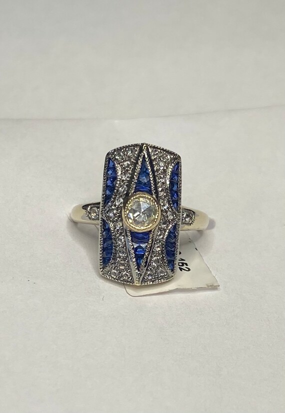 18k gold french cut sapphire and diamond ring