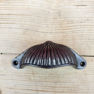 Ridged Sunrise design - cast iron Cup Pull Handle