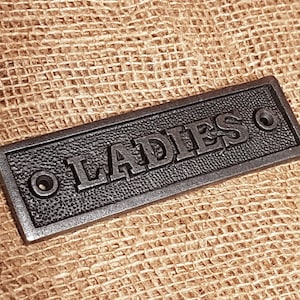 The - Ladies - Cast Iron Vintage plaque