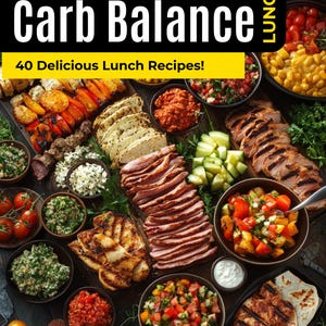 May include: A close-up of a wooden platter filled with various lunch dishes, including grilled chicken, sliced meat, salads, and vegetables. The text "The Protein & Carb Balance" and "40 Delicious Lunch Recipes!" is displayed at the top of the image.