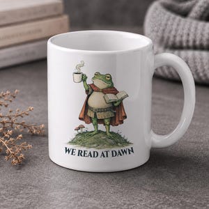 We Read at Dawn Frog Mug – Medieval Frog Reading Coffee Cup