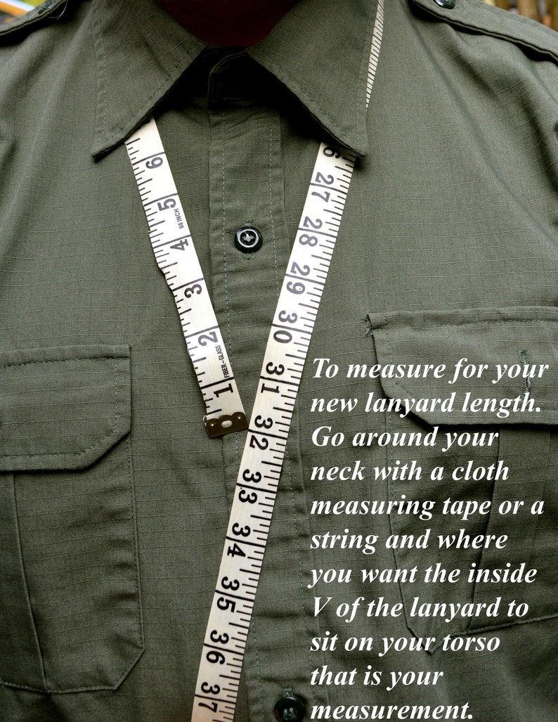 May include: An olive green shirt with a white measuring tape draped around the collar. The tape shows measurements in inches. Text on the image provides instructions on measuring for a lanyard.