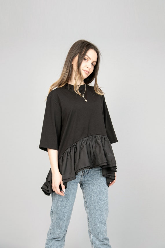 blusa negra suelta