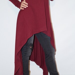 asymmetrical red sweater