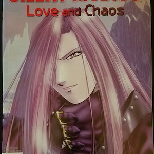 Puede incluir: Una portada de cómic con un hombre de pelo largo morado y una chaqueta de cuero negra. El título del cómic es "Silent Mobius: Love and Chaos".
