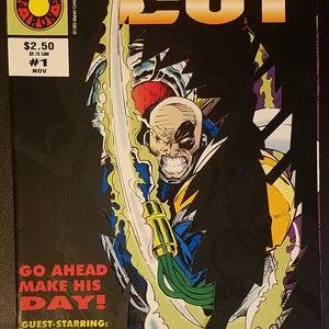 May include: Comic book cover featuring a character with a bald head and a menacing expression. The character is holding a sword and is surrounded by a green and purple energy field. The cover is titled "Die Cut" and features the text "Go Ahead Make His Day!" and "Guest-Starring: The Beast".