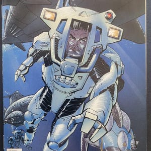 May include: A comic book cover featuring a white robot with a human face inside the helmet. The robot is holding a blue dolphin with a white circle on its head. The comic book title is "SeaQuest DSV" and the issue number is 1.