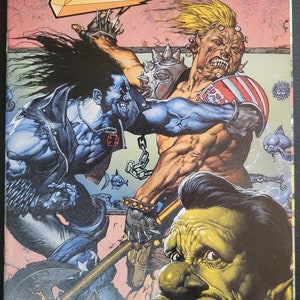 May include: A comic book cover featuring a blue and black character with a red cross on their chest, fighting a muscular, blonde character with a red, white, and blue arm band. The comic book is titled "Lobo: Portrait of a Victim" and is issue number 1 from 1993.