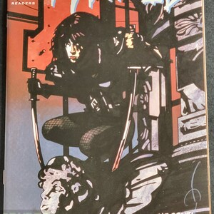 Può includere: Una copertina di fumetto con una donna vestita di nero che tiene due spade. La copertina è intitolata "Typhoid" e presenta il testo "Marvel Edge" e "For Mature Readers".