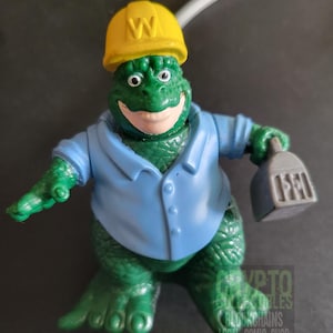 Earl Sinclair from Dinosaurs, Dino-Motion (1993) Happy Meal Toy
