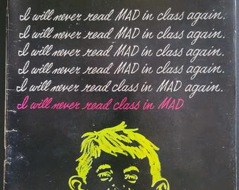 May include: Vintage MAD Magazine cover, No. 128, July 1969, with a chalkboard-style design. The cover features the MAD logo in yellow, the price, and the phrase "I will never read MAD in class again." A cartoon face is at the bottom.