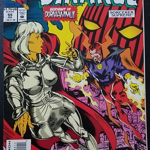 May include: A comic book cover featuring Dr. Strange, a superhero with a red cape and a purple suit, battling a woman in silver armor. The cover text reads "Dr. Strange, Servant of Dormammu!" and "Sorcerer Supreme".