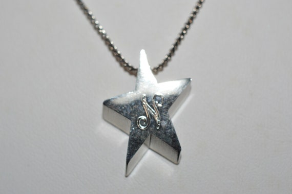 Silver Star Necklace With 