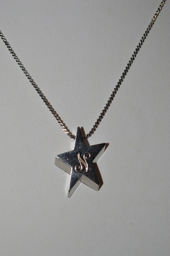 Silver Star Necklace With 