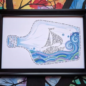 May include: Framed art print featuring a stylized bottle design with a sailboat inside. The artwork is filled with blue, purple, and green watercolor waves and text. The black frame enhances the artwork's presentation.