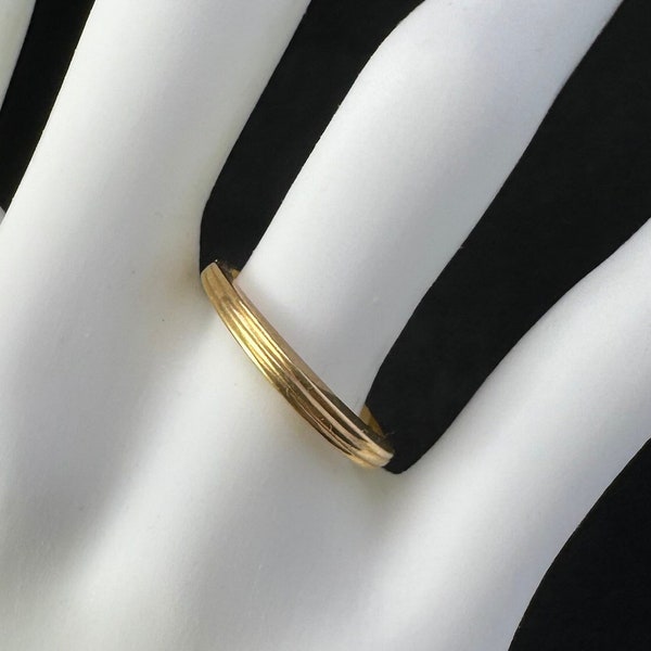 18 karat yellow gold band ring in size 8 US.  Three tiered 18 K gold band style ring in classic styling for wedding or anniversary.  12011