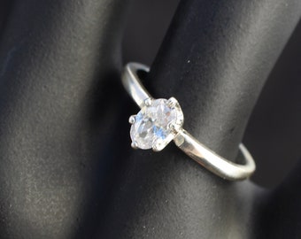 Marquise brilliant .85 karat CZ (cubic zirconia) by in sterling size 7.5  ring for engagement, wedding, anniversary. 11439 AW