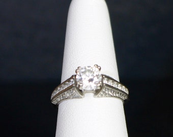 CZ, Silver ring: Round, brilliant, diamond look CZ, with matched small CZ's in sterling silver Edwardian, engagement, wedding setting. c5780