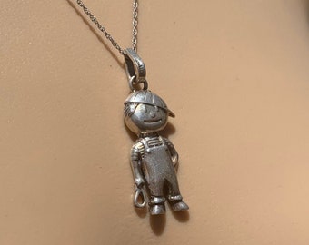 Boy/Child Character silver pendant:  Tough little boy, with crooked baseball cap, sterling silver pendant on 20”chain for Mom. 10333