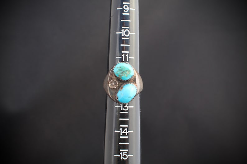 Navajo A-73 Men\u2019s Native American old pawn in size 12 US with two turquoise stones and tribal symbol heavy sterling silver ring