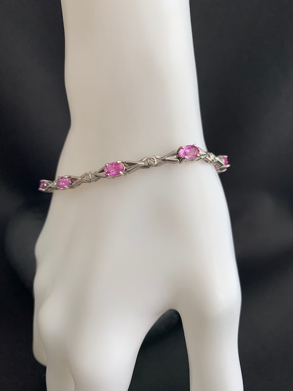 Pink stone bracelet:  Sterling silver bracelet wit