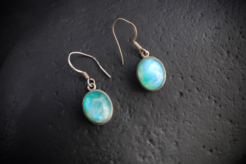 For her mom sister 10057 set in sterling silver with wire hook hangers from the eighties Oval \u201cCloudy Sky\u201d stones with blue and greens