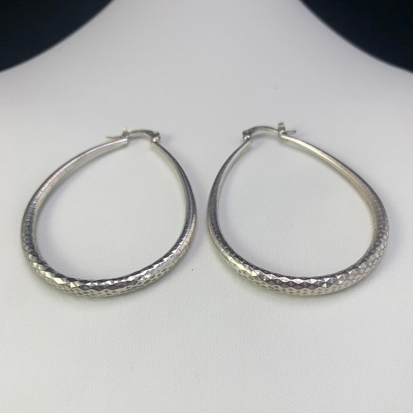 Hoop-Tear drop-Oval Sterling silver Earrings:  Solver dimpled large oval/teardrop/hoop earrings with a 925 sterling silver earrings.  11919