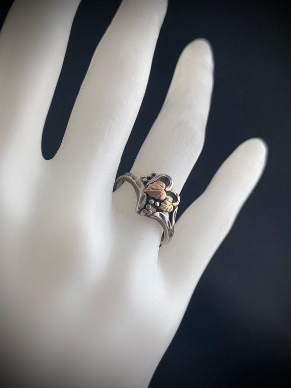 Sterling silver and 12k gold ring:  Pair of leafs 