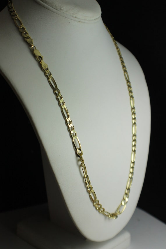 Beautiful 12kt 24 long designer chain very pretty Looks amazingly like 14kt.!! Figaro style