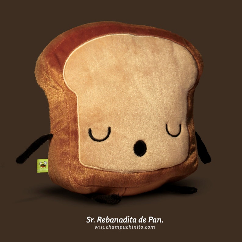 Puede incluir: Un peluche con forma de rebanada de pan, con un centro marr&oacute;n claro y una corteza marr&oacute;n m&aacute;s oscura. El juguete tiene los ojos cerrados, una peque&ntilde;a boca abierta y brazos y piernas negros. El texto "Sr. Rebanadita de Pan." y una direcci&oacute;n web est&aacute;n en la parte inferior.
