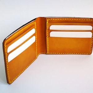 Cartera doble de cuero marrón y amarillo