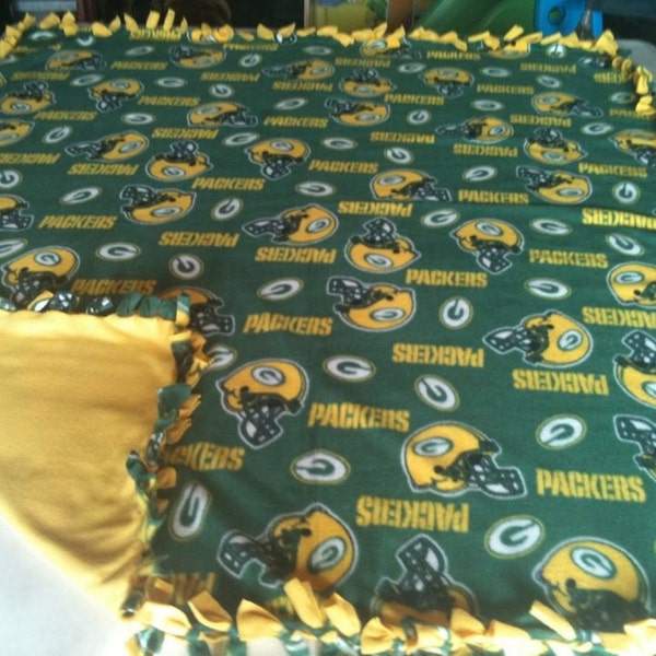 Green Bay Packers double sided, hand tied, fleece blankets.