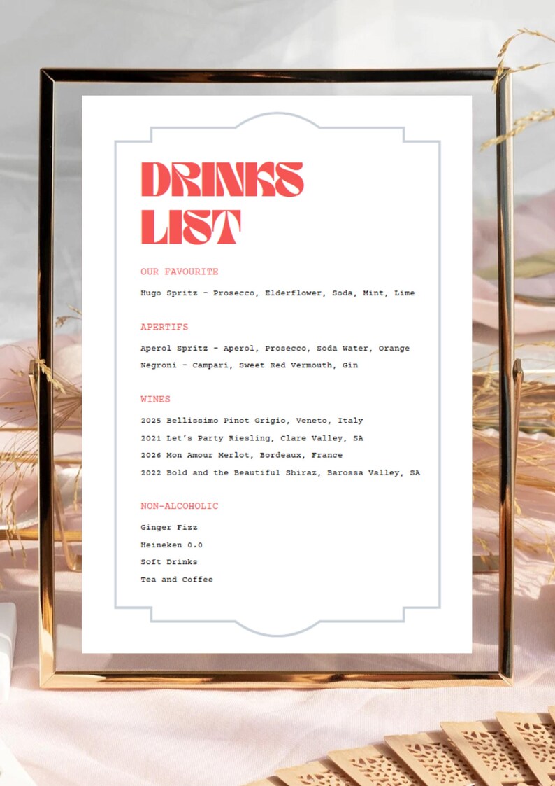 Puede incluir: Una lista de bebidas enmarcada con un t&iacute;tulo rojo y blanco "DRINKS LIST". La lista incluye una secci&oacute;n para "Our Favourite", "Aperitifs", "Wines" y "Non-Alcoholic".